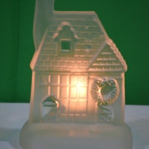 Christmas Winter Cottage Scene with candle
